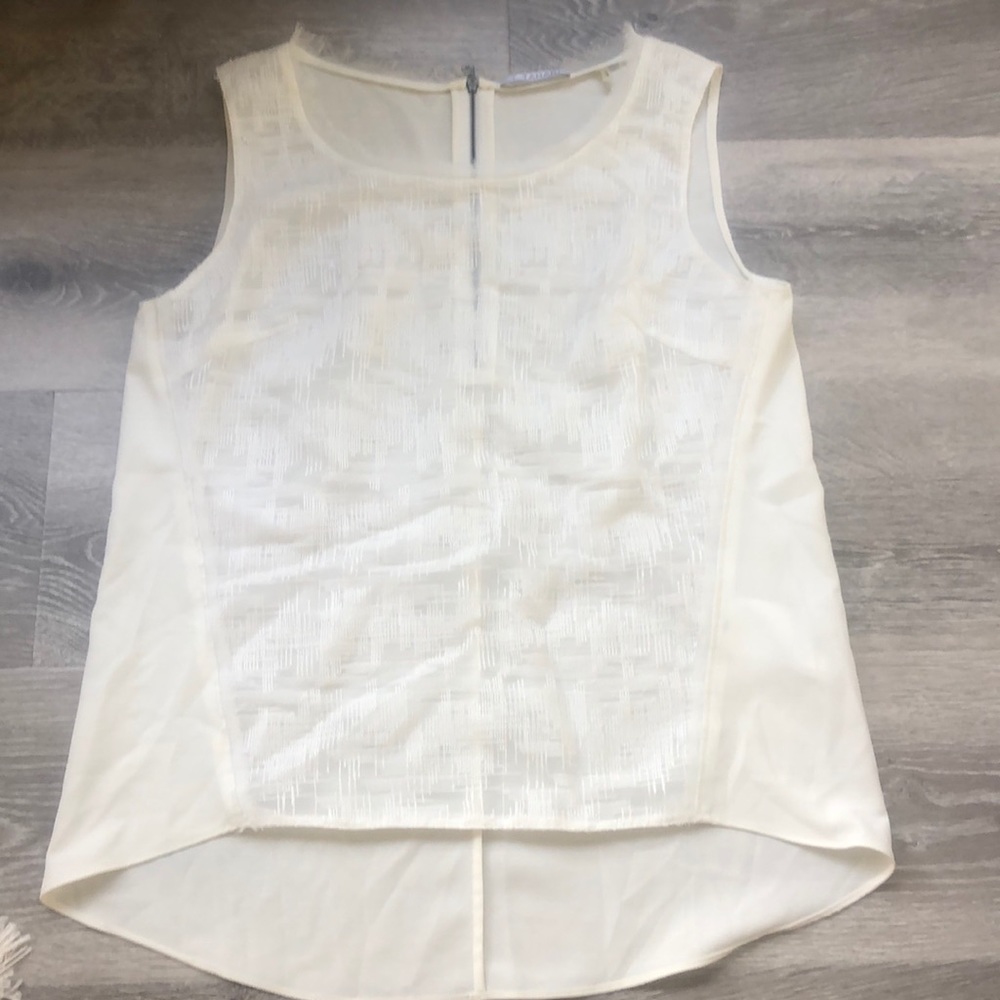 White sleeveless blouse